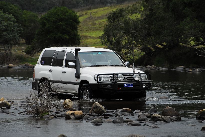 03-Hoppy drives across the Snowy River at Jacksons Crossing.JPG